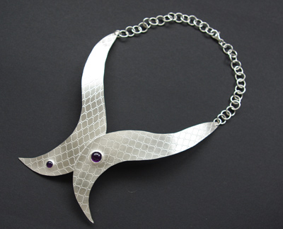 Chris Alcock, neckpiece