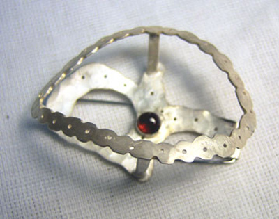 Yuki Sasakura, brooch with garnet